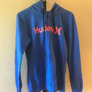 blue hooded zip up sweatshirt
